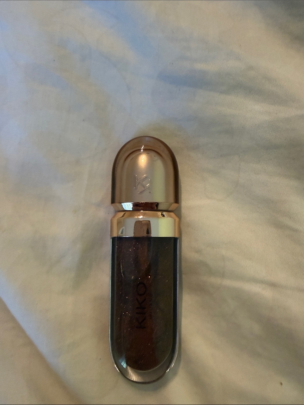 Kiko Shimmery Dark Brown Lip Gloss with Rose Gold Cap